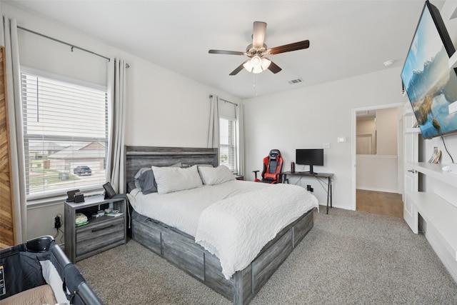 2028 Saddle Way, Mesquite, TX 75149 - carpeted bedroom with a ceiling fan