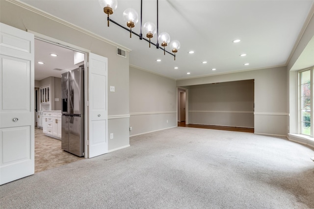 4023 Candlenut Ln, Dallas, TX 75244 - spare room featuring light carpet, crown molding, a chandelier, recessed lighting, and baseboards