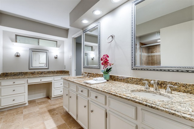 4023 Candlenut Ln, Dallas, TX 75244 - full bathroom with double vanity, a tile shower, and recessed lighting