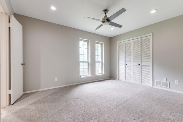 4023 Candlenut Ln, Dallas, TX 75244 - unfurnished bedroom with carpet, baseboards, recessed lighting, a closet, and a ceiling fan