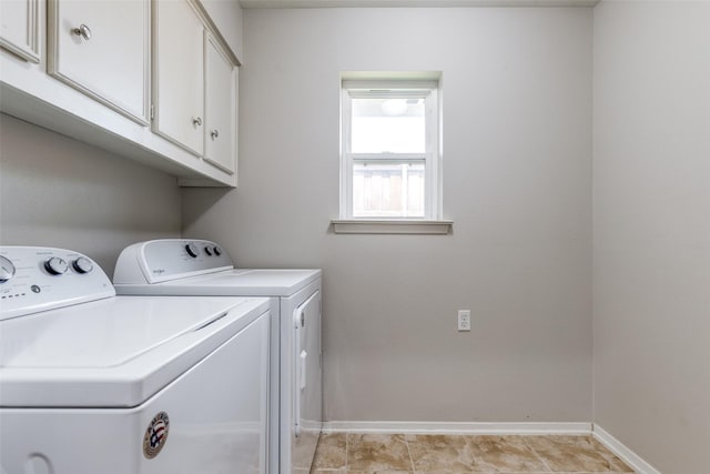 4023 Candlenut Ln, Dallas, TX 75244 - washroom with washing machine and clothes dryer, cabinet space, and baseboards