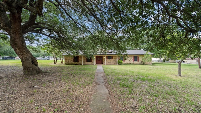 1015 Monte Carlo Dr, Grand Saline, TX 75140 - ranch-style home with a front lawn