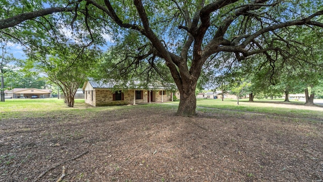 1015 Monte Carlo Dr, Grand Saline, TX 75140 - view of grassy yard