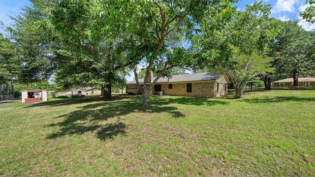 1015 Monte Carlo Dr, Grand Saline, TX 75140 - view of grassy yard