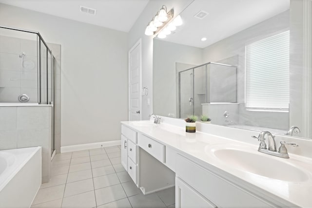 15717 Preble Rd, Fort Worth, TX 76177 - full bath with double vanity, a bath, a stall shower, tile patterned flooring, and baseboards