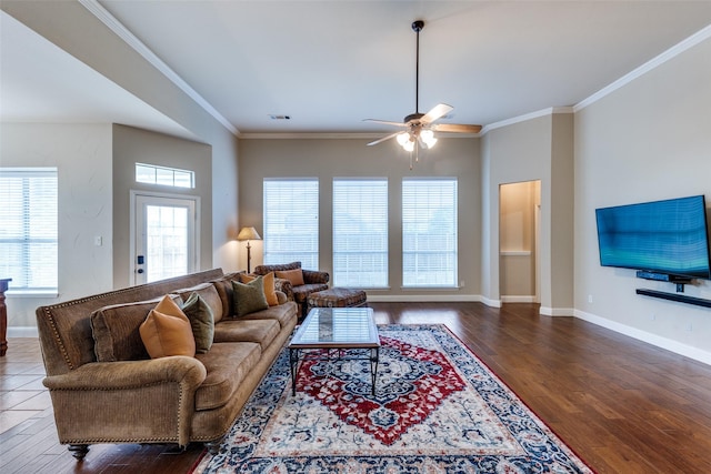 1616 Teakwood Dr, Wylie, TX 75098 - living room with wood finished floors, ceiling fan, crown molding, and baseboards