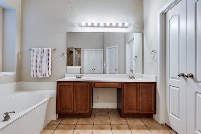 1616 Teakwood Dr, Wylie, TX 75098 - full bath with double vanity, tile patterned floors, a bath, and a shower