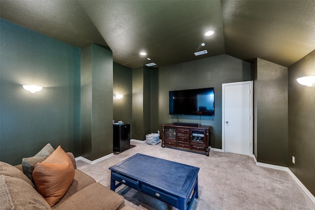 1616 Teakwood Dr, Wylie, TX 75098 - cinema room with a textured ceiling, carpet floors, vaulted ceiling, and baseboards