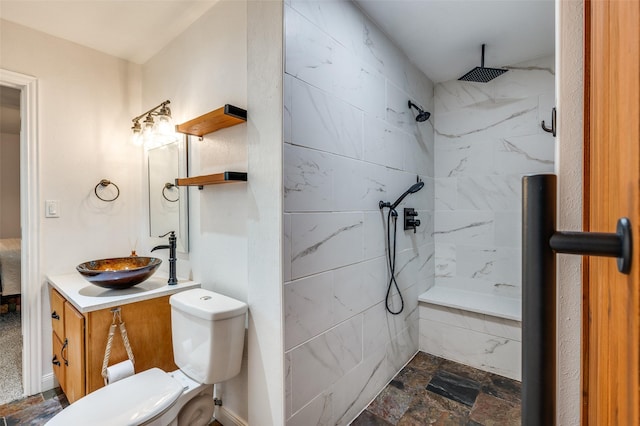 141 Stonegate Ct, Bedford, TX 76022 - bathroom with vanity, a marble finish shower, toilet, and stone finish floors