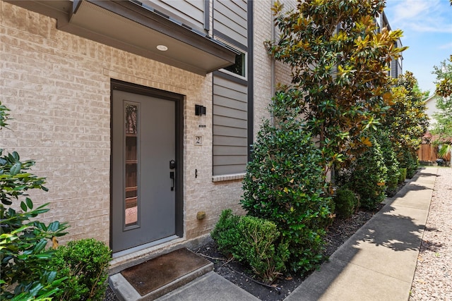 5909 Ross Ave Unit 2, Dallas, TX 75206 - doorway to property featuring brick siding