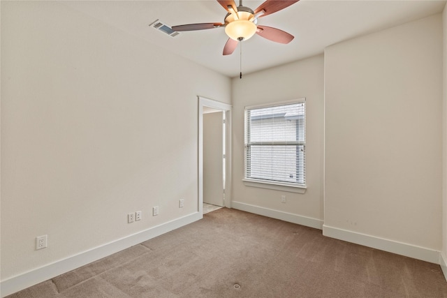 5909 Ross Ave Unit 2, Dallas, TX 75206 - carpeted empty room featuring a ceiling fan and baseboards