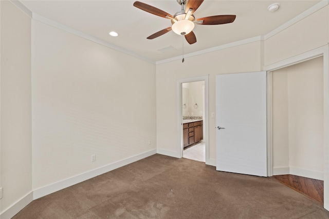 5909 Ross Ave Unit 2, Dallas, TX 75206 - unfurnished bedroom with carpet floors, ornamental molding, baseboards, connected bathroom, and a ceiling fan