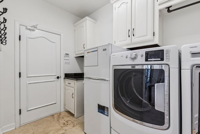 1117 Charleston Ct, Keller, TX 76248 - washroom with separate washer and dryer, cabinet space, and light tile patterned floors