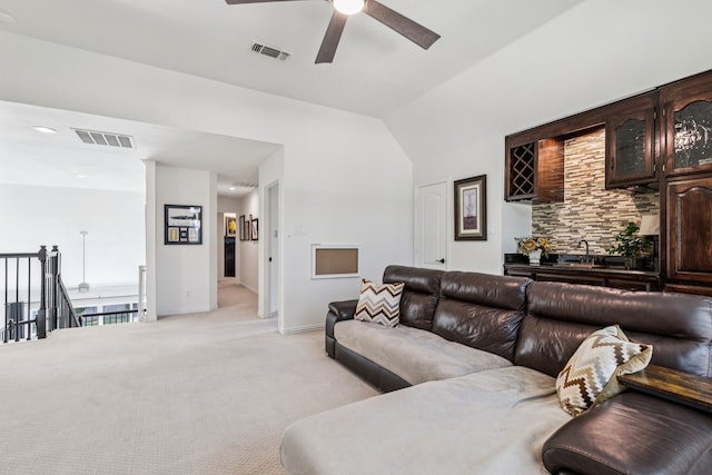 1117 Charleston Ct, Keller, TX 76248 - living room featuring light carpet, ceiling fan, vaulted ceiling, and baseboards