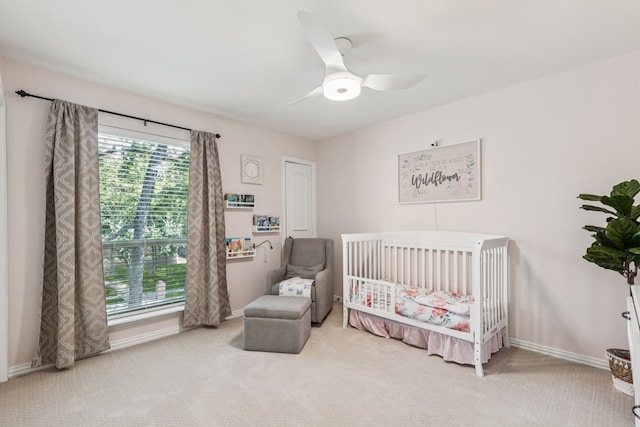 1117 Charleston Ct, Keller, TX 76248 - carpeted bedroom featuring a nursery area, baseboards, and a ceiling fan