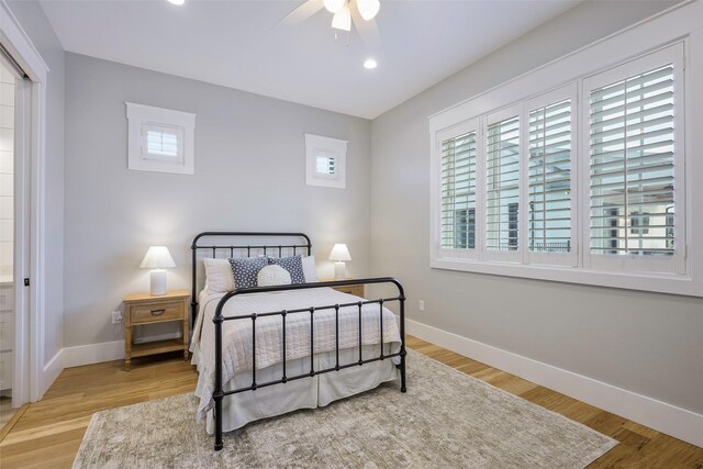 36 Mirror Lakes Ct, Gunter, TX 75058 - bedroom featuring multiple windows, baseboards, wood finished floors, and recessed lighting