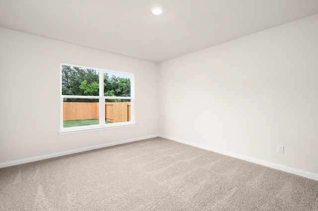 104 Southgate Dr, Terrell, TX 75160 - carpeted empty room featuring baseboards and recessed lighting