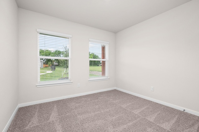 104 Southgate Dr, Terrell, TX 75160 - carpeted empty room featuring baseboards