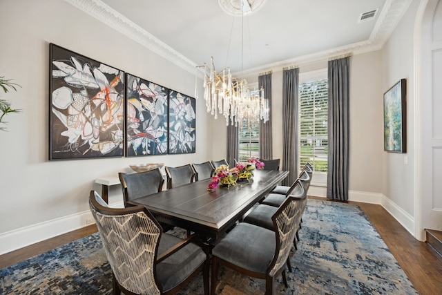 504 Bristol Dr, Allen, TX 75013 - dining space with baseboards, a chandelier, wood finished floors, and crown molding
