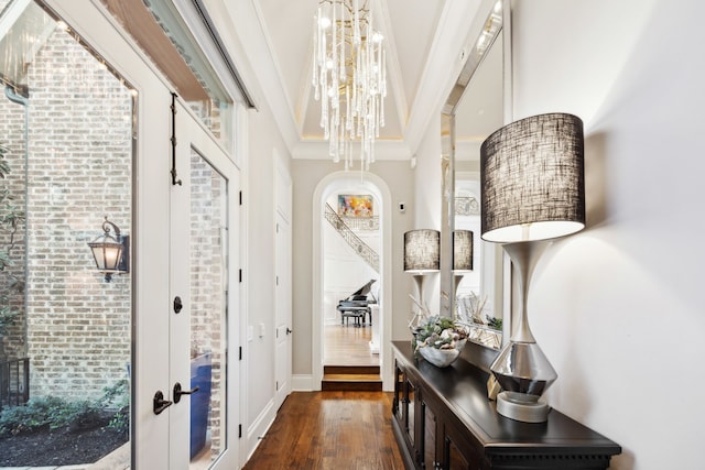 504 Bristol Dr, Allen, TX 75013 - foyer entrance with dark wood-style floors, a chandelier, and baseboards