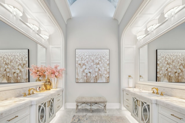 504 Bristol Dr, Allen, TX 75013 - full bathroom featuring baseboards, marble look tile flooring, and vanity