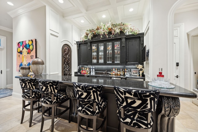 504 Bristol Dr, Allen, TX 75013 - indoor wet bar featuring ornamental molding, recessed lighting, arched walkways, and coffered ceiling