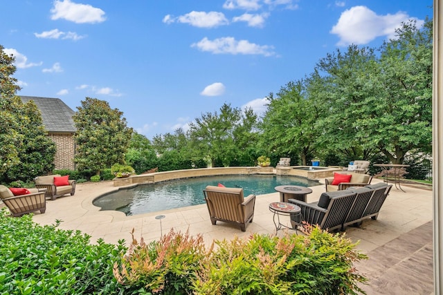 504 Bristol Dr, Allen, TX 75013 - view of swimming pool featuring a patio area, an outdoor living space with a fire pit, and a pool with connected hot tub