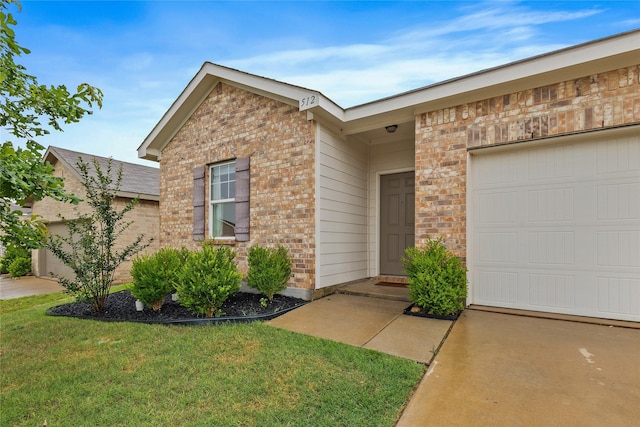 512 Leeward Ln, Crowley, TX 76036 - view of front facade with brick siding, an attached garage, a front lawn, and concrete driveway