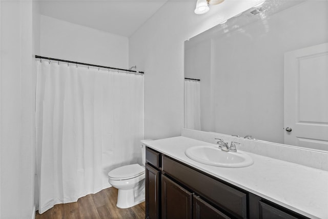512 Leeward Ln, Crowley, TX 76036 - full bathroom featuring toilet, vanity, wood finished floors, and shower / bath combination with curtain