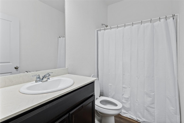 512 Leeward Ln, Crowley, TX 76036 - full bath with vanity, toilet, curtained shower, and wood finished floors