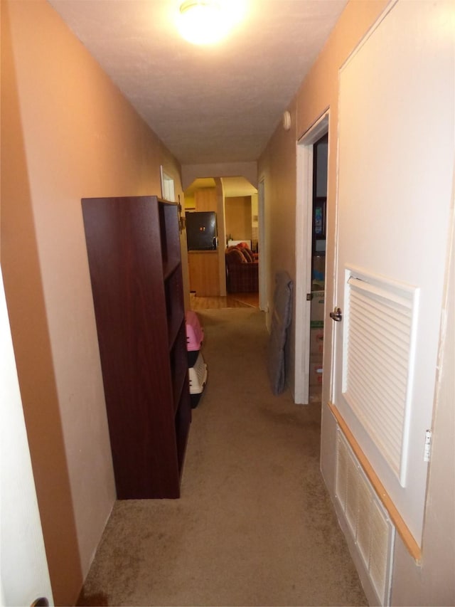 225 County Road 472, Ranger, TX 76470 - corridor with light carpet and arched walkways