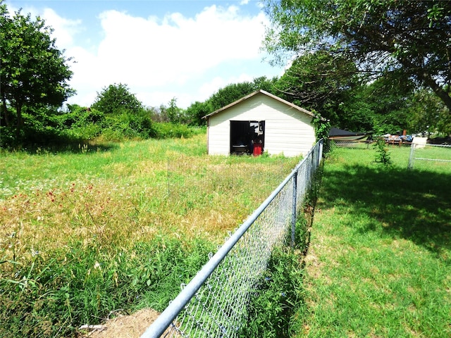 225 County Road 472, Ranger, TX 76470 - view of yard with an outdoor structure and a garage
