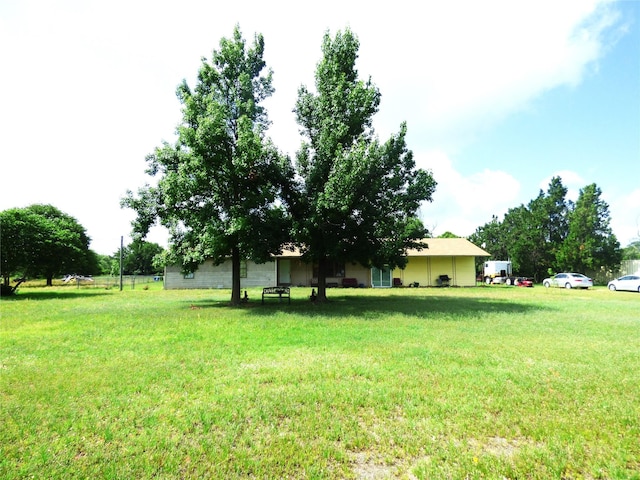 225 County Road 472, Ranger, TX 76470 - view of green lawn