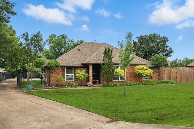 7906 Pennridge Cir, Rowlett, TX 75088 - view of front of house with brick siding, concrete driveway, and a shingled roof