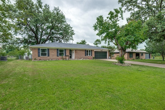 1434 Southland St, Sulphur Springs, TX 75482 - ranch-style house featuring a garage, concrete driveway, and brick siding