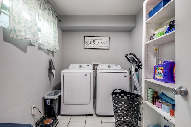 1434 Southland St, Sulphur Springs, TX 75482 - laundry area with separate washer and dryer and light tile patterned floors