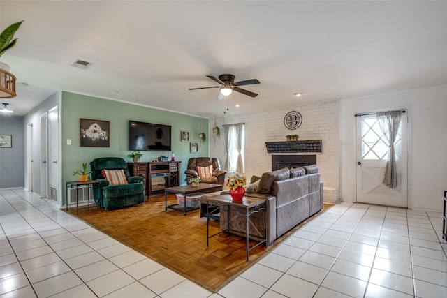 1434 Southland St, Sulphur Springs, TX 75482 - living room featuring ceiling fan and a brick fireplace