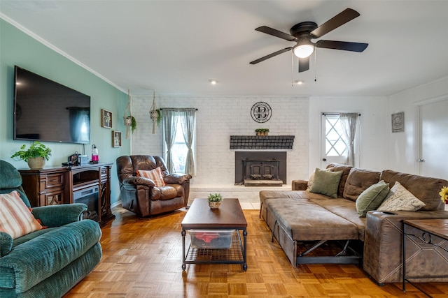 1434 Southland St, Sulphur Springs, TX 75482 - living room with a brick fireplace, ceiling fan, and crown molding