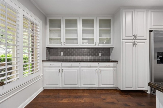 4517 Cloudview Rd, Fort Worth, TX 76109 - kitchen featuring stainless steel refrigerator with ice dispenser, dark wood finished floors, and glass insert cabinets