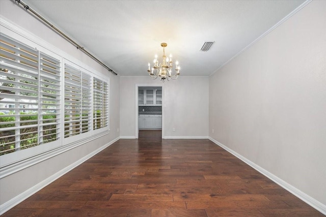 4517 Cloudview Rd, Fort Worth, TX 76109 - unfurnished dining area with a chandelier, ornamental molding, wood finished floors, and baseboards