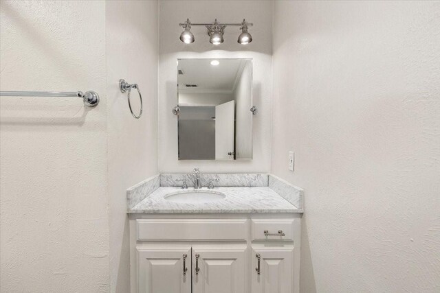 4517 Cloudview Rd, Fort Worth, TX 76109 - full bathroom featuring tile patterned floors, crown molding, vanity, bathing tub / shower combination, and baseboards