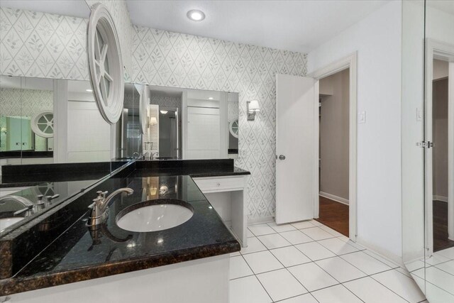 4517 Cloudview Rd, Fort Worth, TX 76109 - bathroom with a closet, double vanity, tile patterned floors, and bathing tub / shower combination