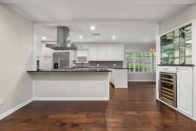 4517 Cloudview Rd, Fort Worth, TX 76109 - kitchen with stainless steel refrigerator with ice dispenser, island range hood, dark countertops, a peninsula, and wine cooler