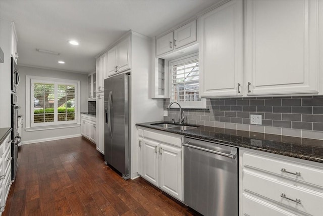 4517 Cloudview Rd, Fort Worth, TX 76109 - kitchen with appliances with stainless steel finishes, a sink, white cabinetry, and recessed lighting