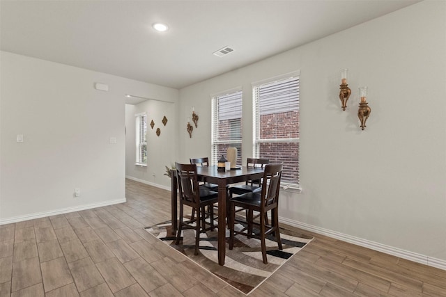 620 Ruthye Ln, Pilot Point, TX 76258 - dining space with wood finished floors, baseboards, and recessed lighting