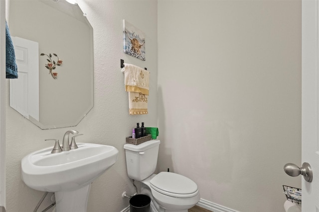 620 Ruthye Ln, Pilot Point, TX 76258 - bathroom with toilet and baseboards