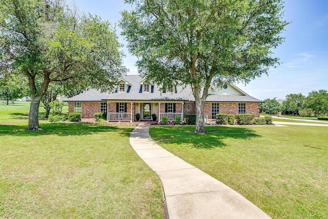 3809 Timbercrest Dr W, Burleson, TX 76028 - view of front facade featuring brick siding, covered porch, a front yard, and a shingled roof