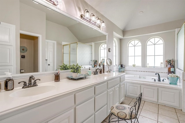 3809 Timbercrest Dr W, Burleson, TX 76028 - full bath with lofted ceiling, double vanity, a shower stall, a bath, and tile patterned floors