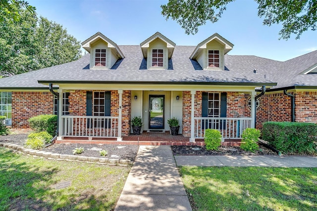 3809 Timbercrest Dr W, Burleson, TX 76028 - view of front of property featuring covered porch, brick siding, and a shingled roof