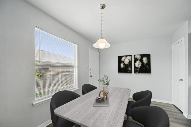 4811 Pachuca Ct, Dallas, TX 75236 - dining space with wood finished floors and baseboards